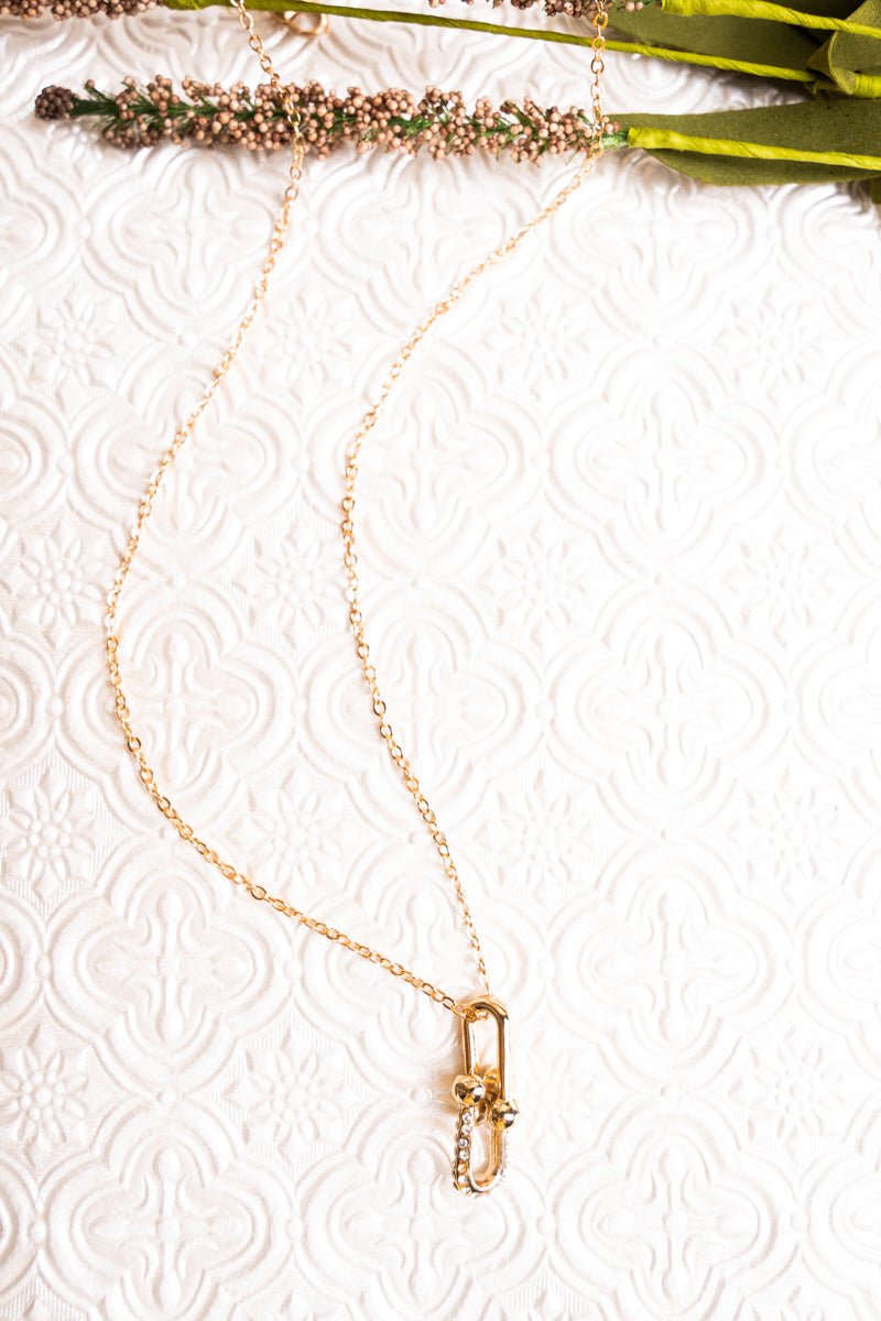 Crystal Avenue Holding Hands Crystal Goldtone Necklace - Wholesale Accessory Market