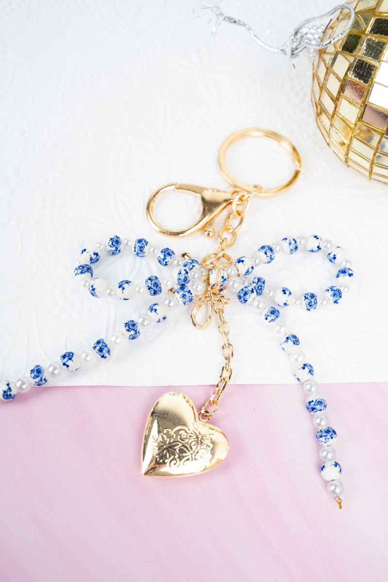 Crystal Avenue Blue Flower Beaded Bow Keychain - Wholesale Accessory Market