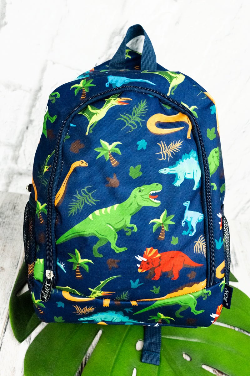 https://www.wholesaleaccessorymarket.com/cdn/shop/products/dif403s-navyngil-dino-mite-medium-backpack-575917_1200x.jpg?v=1684868928