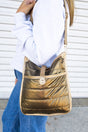 10% OFF! Lake Tahoe Metallic Gold Puffy Crossbody - Wholesale Accessory Market