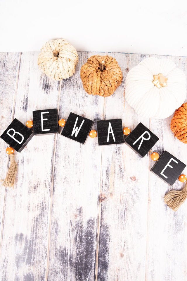 27 x 2.5 Black 'Beware' Wood Beaded Tabletop Decor - Wholesale Accessory Market